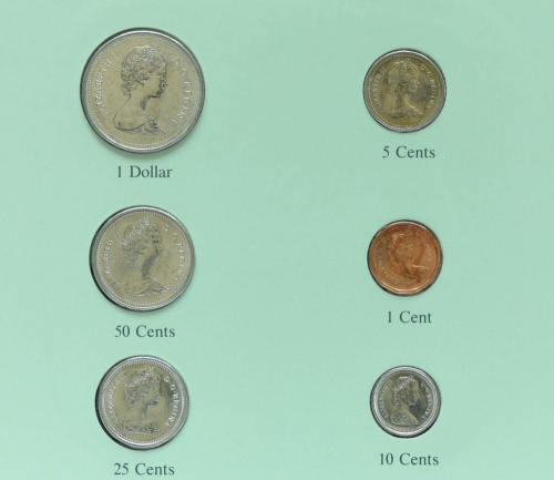 фото Канада Набор монет 1984-1985 UNC 1, 5, 10, 25, 50 центов, 1 доллар и 1 марка в сувенирной упаковке